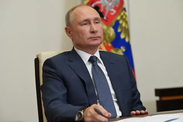 Russia's President Vladimir Putin takes part in a ceremony to open multifunctional medical centers of the Russian Defense Ministry via a video link from Novo-Ogaryovo residence.