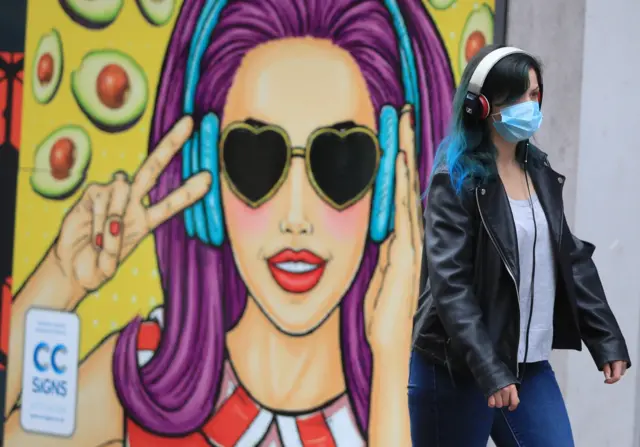 A woman wearing a face mask in Nottingham city centre