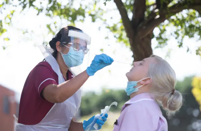 A woman being tested for Covid