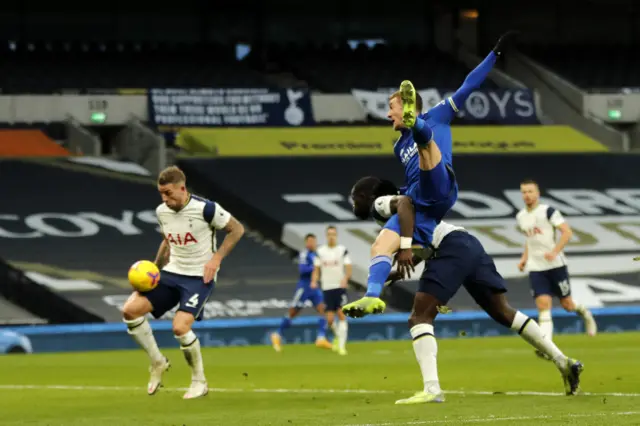 Jamie Vardy of Leicester watches on as his header deflects off Tottenham's Toby Alderweireld into the net