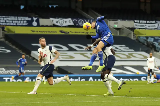 Leicester's Jamie Vardy heads back across goal against Tottenham