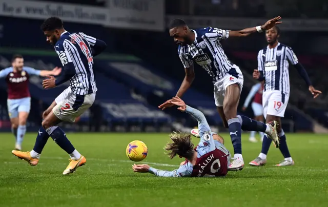 Semi Ajayi of West Bromwich Albion fouls Jack Grealish of Aston Villa leading to a penalty during the Premier League match between West Bromwich Albion and Aston Villa at The Hawthorns