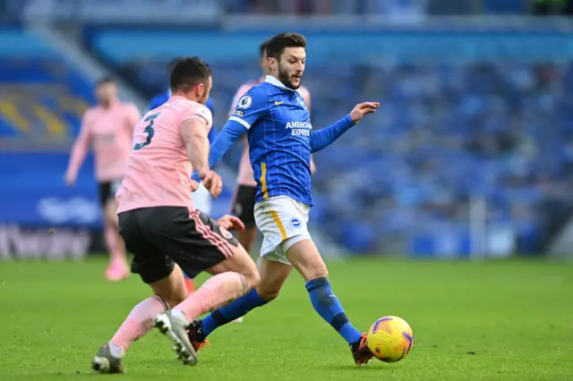 Brighton's Adam Lallana in action against Sheffield United