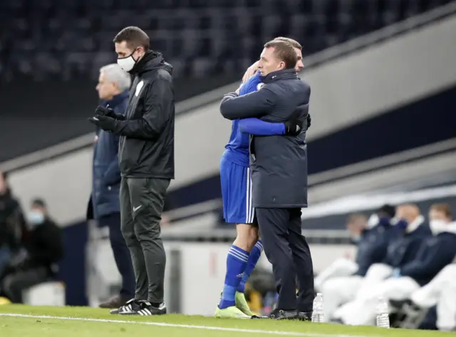 Leicester City's Jamie Vardy hugs manager Brendan Rodgers after being substituted against Tottenham