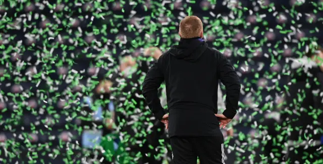 Neil Lennon looks on as the tickertape rains down at Hampden