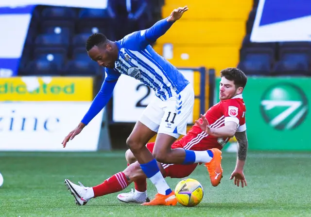 Nicke Kabamba is tackled by Aberdeen's Matty Kennedy