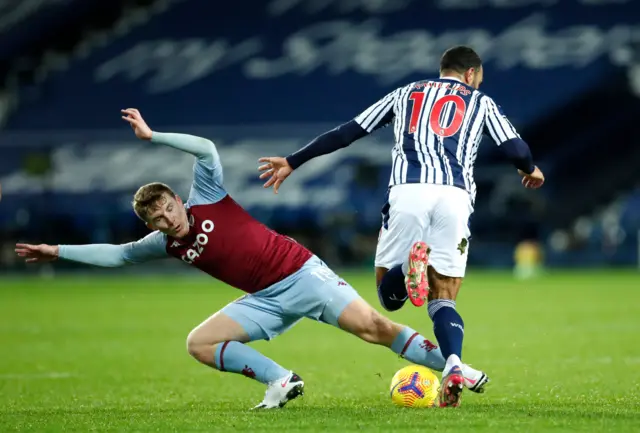 Matt Targett of Aston Villa battles for possession with Matt Phillips of West Bromwich Albion during the Premier League match between West Bromwich Albion and Aston Villa at The Hawthorns