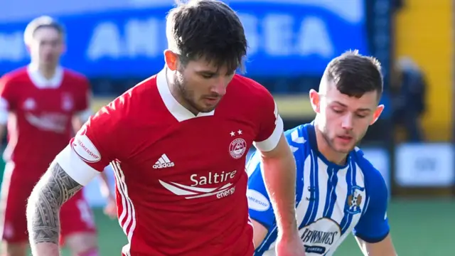 Aberdeen's Matty Kennedy and Kilmarnock's Calum Water do battle at Rugby Park