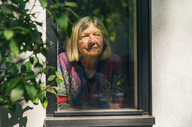 woman shielding at home