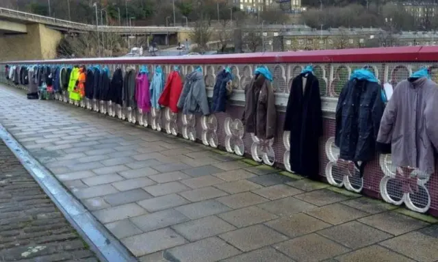 Coats on bridge