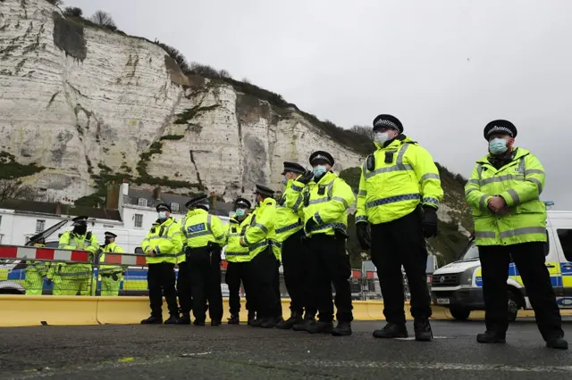 Police officers blocking the entrance to the Port of Dover in Kent