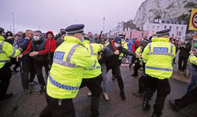 Police hold back drivers trying to enter the Port of Dover