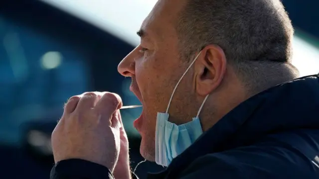 A man taking a coronavirus test