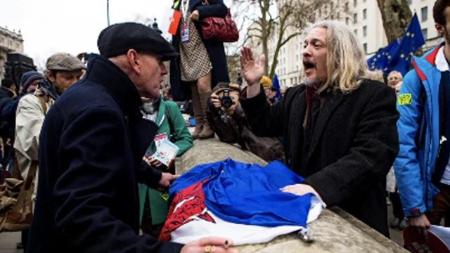 Pro and anti Brexit campaigners arguing in Whitehall during