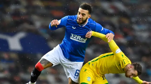 Rangers' Connor Goldson and Hibernian's Martin Boyle