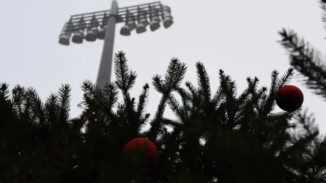 Floodlight above a Christmas tree