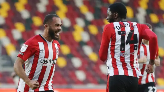 Bryan Mbeumo and Josh Dasilva cleebrate a goal