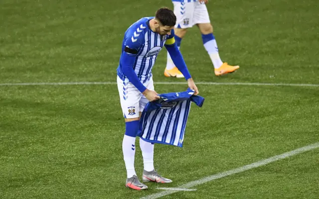 Kirk Broadfoot lays a strip on the pitch