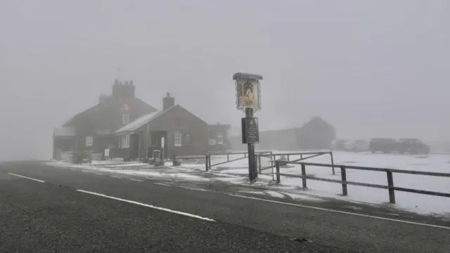 Snowy scenes at the Cat and Fiddle pub on the Derbyshire-Cheshire border