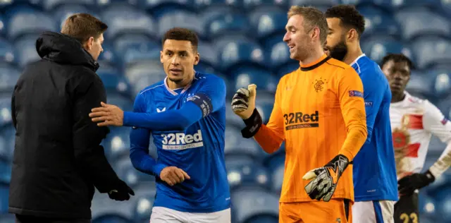 Manager Steven Gerrard with captain James Tavernier and goalkeeper Allan McGregor