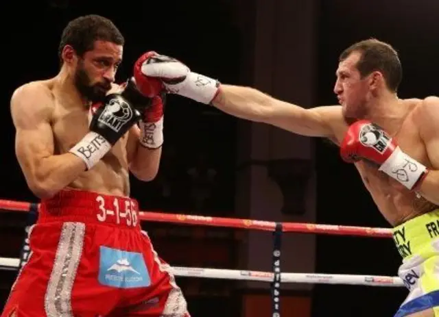 Derry Mathews (right) and Curtis Woodhouse in action during the Commonwealth Lightweight Title bout…