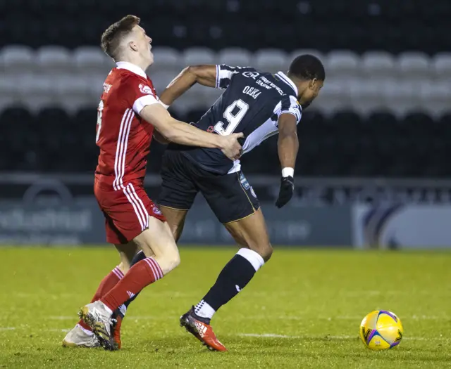 Lewis Ferguson received a second yellow card for this challenge on St Mirren's Jon Obika