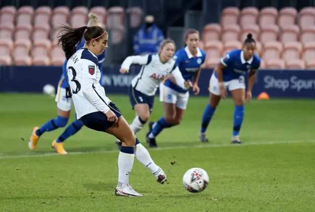 Alex Morgan scores