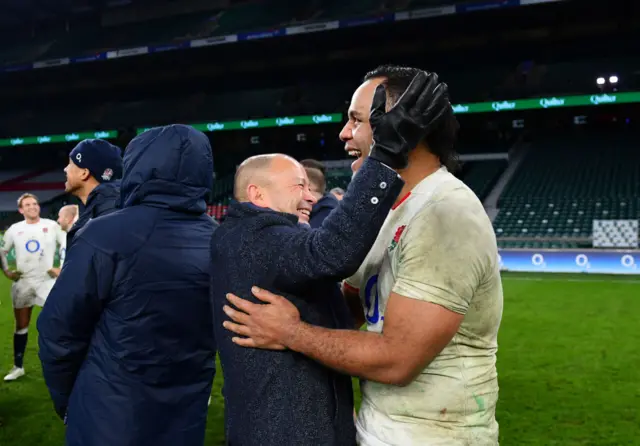 Eddie Jones celebrates with Billy Vunipola