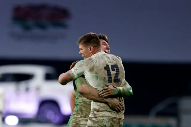 Owen Farrell and Tom Curry hug in celebration