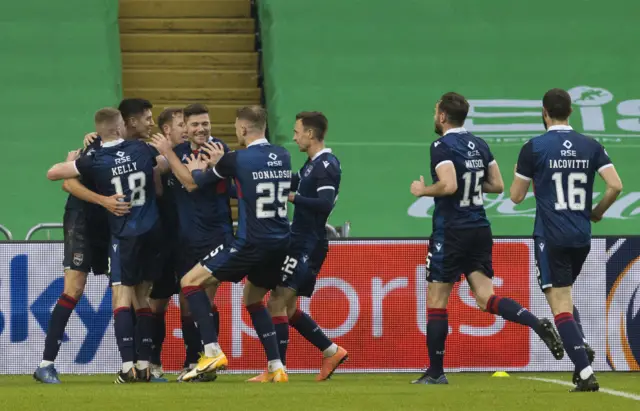 Ross County celebrate Ross Stewart's first-half penalty at Celtic Park last Sunday