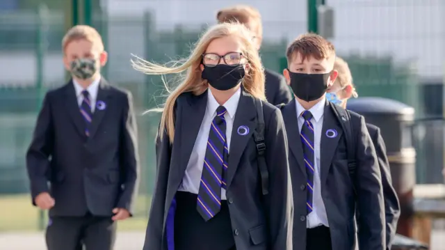 School children wearing masks