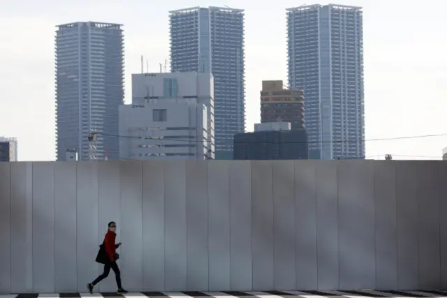 A woman wearing a protective mask in Tokyo