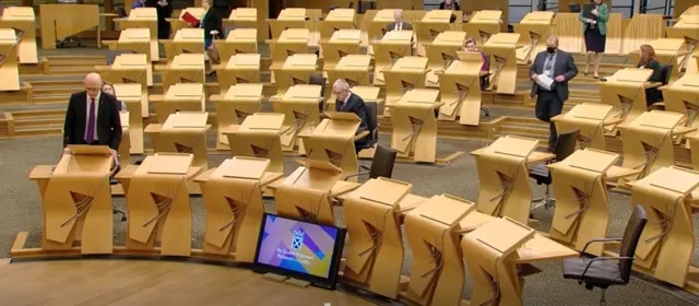 John Swinney in Scottish Parliament