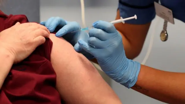 Vaccine being given