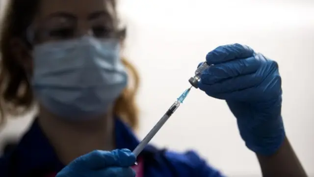 Nurse with vaccine