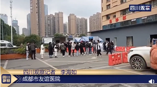 People queue for testing at a local hospital