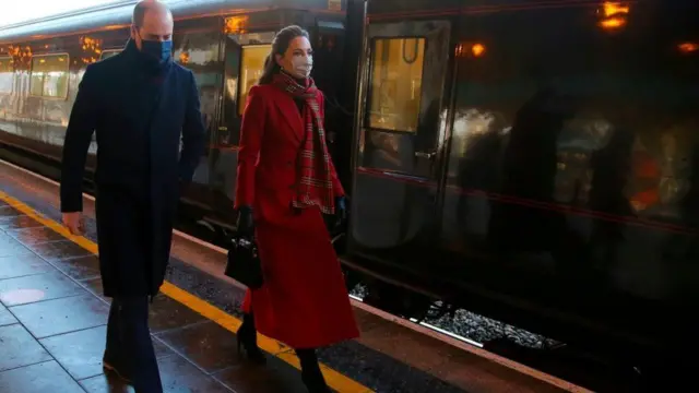 The duke and duchess by the royal train