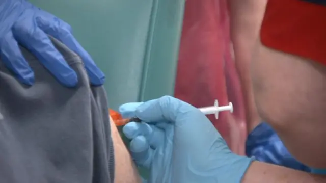 Man getting vaccine at Northern General Hospital in Sheffield