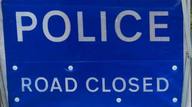 Police Road Closed sign