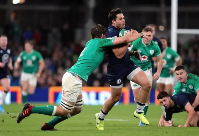 Iain Henderson tackles Sean Maitland