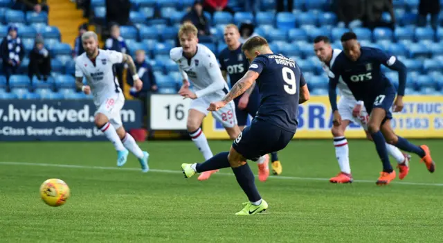 Eamonn Brophy tucks away a penalty