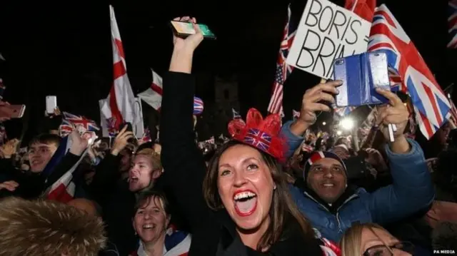 Brexit-supporters celebrate the UK leaving the EU in Parliament Square