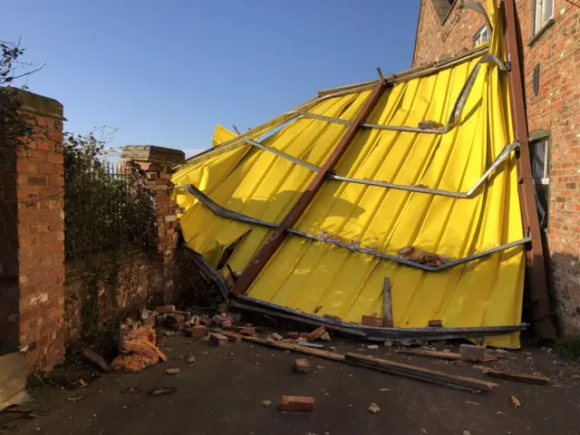 Damage to large yellow fence