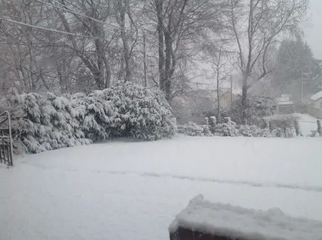 Parts of Scotland have been blanketed in snow, as one reader's photo from Kingussie, in the Scottish Highlands, shows.