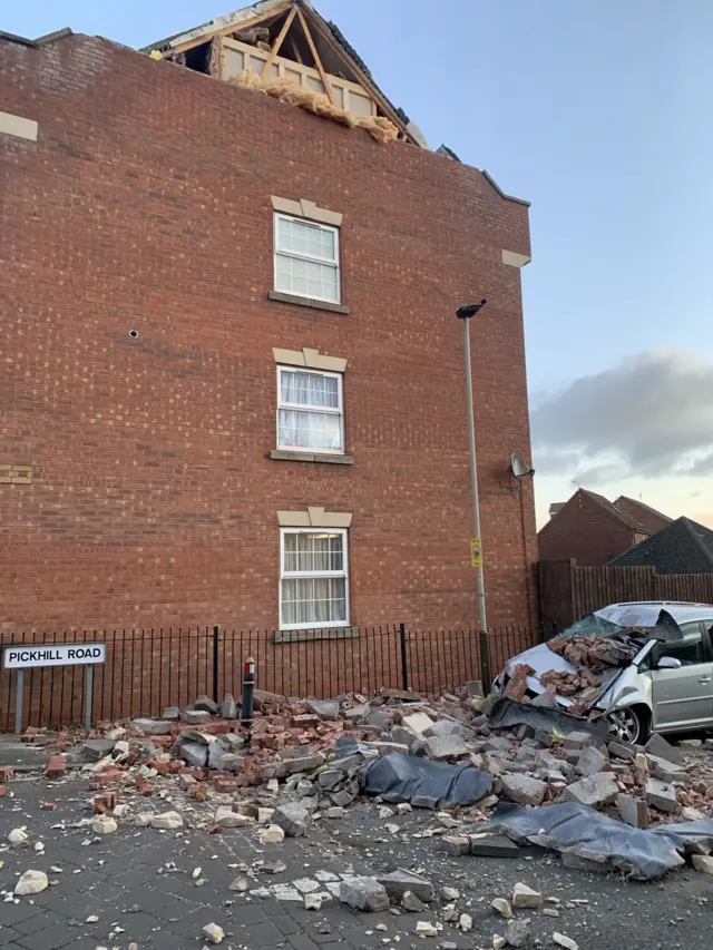 Roof collapsed onto road crushing car on Hamilton Circle, Leicester