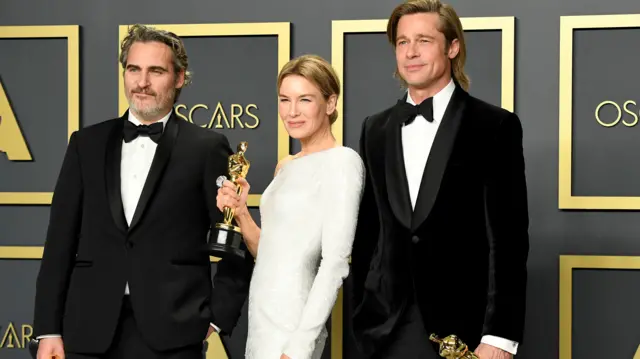 Acting Oscar winners Joaquin Phoenix, Renee Zellweger and Brad Pitt,