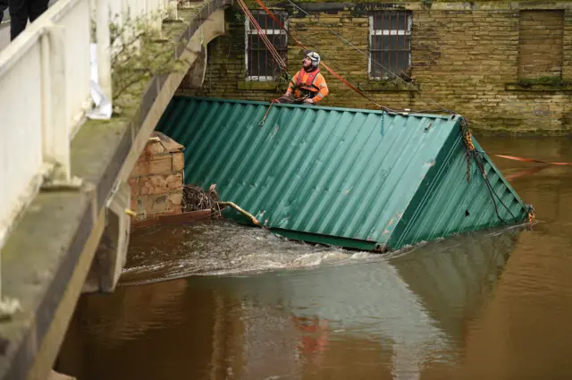 Trapped shipping container at Rastrick bridge