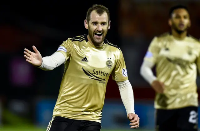 Niall McGinn celebrates making it 2-0 to the visitors