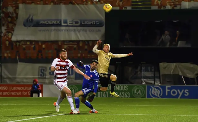 Curtis Main watches his lob sail into the back of the net