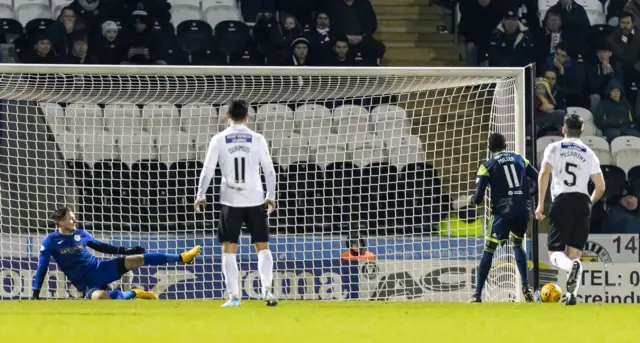Mikel Miller looks on in horror as his late penalty slides past the post in Paisley